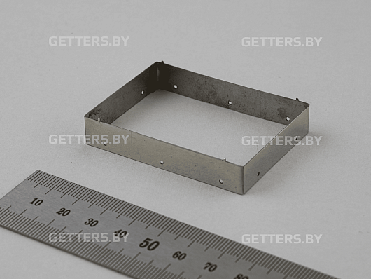 TWO-COMPONENT MOLDED RF SHIELDS
