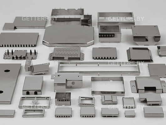 TWO-COMPONENT MOLDED MULTI-SECTION SHIELDS