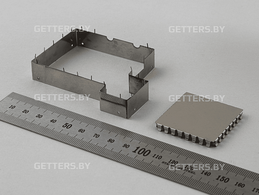 TWO-COMPONENT MOLDED RF SHIELDS